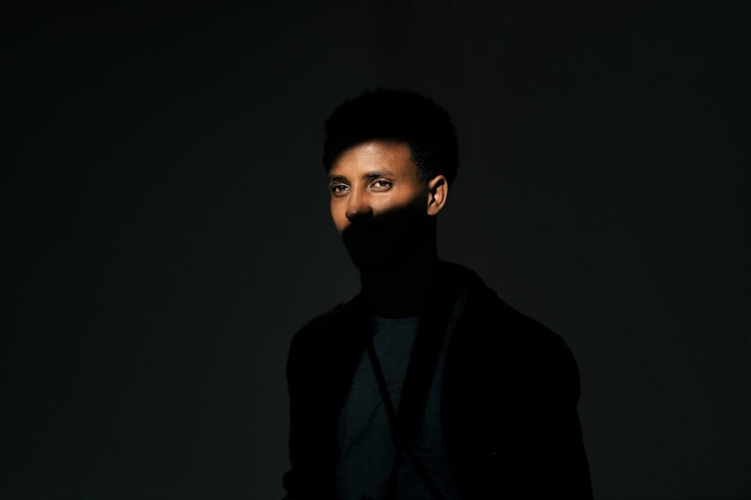 Slovenian man in dark turtleneck looking at camera