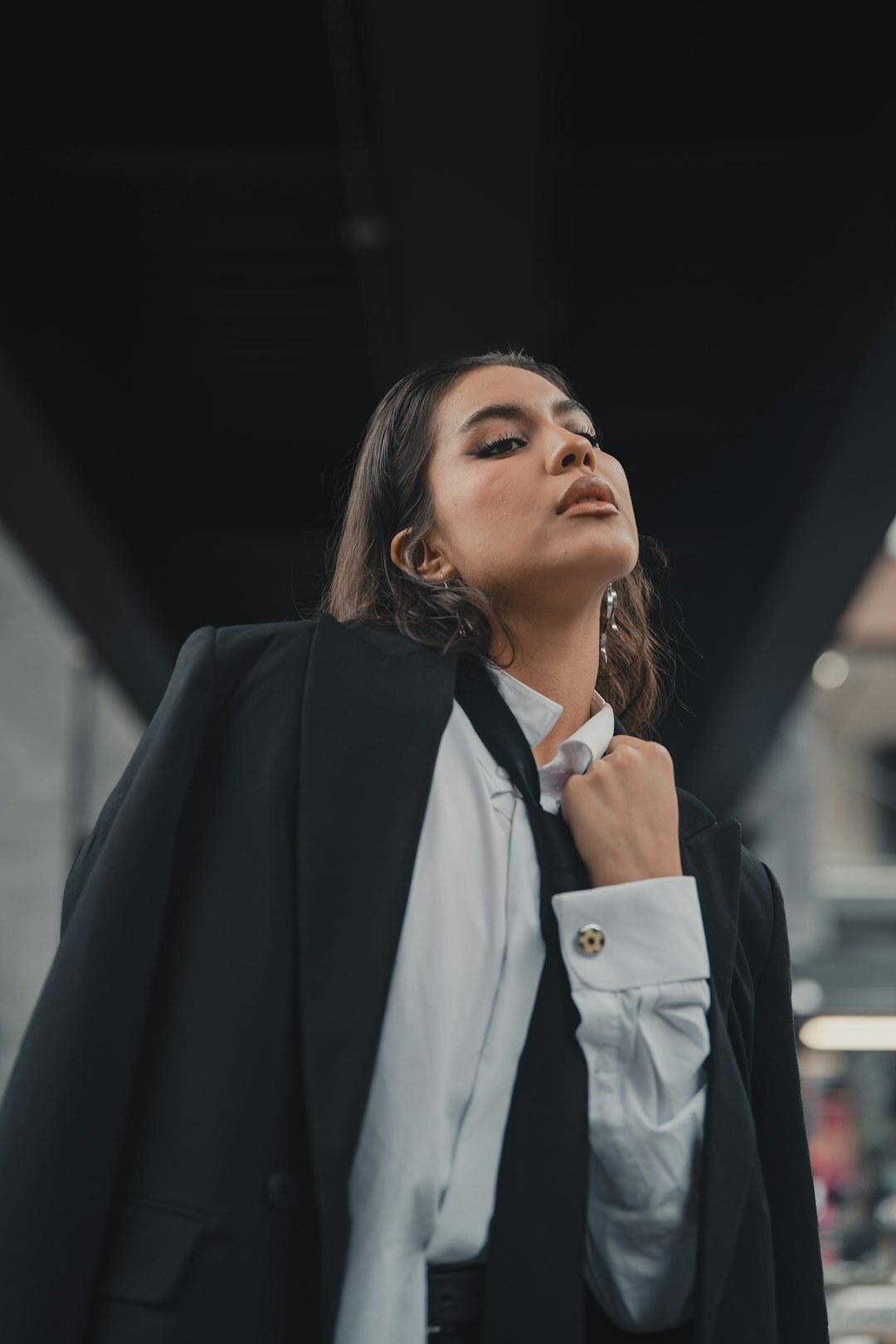 Slovenian woman in business attire smiling confidently
